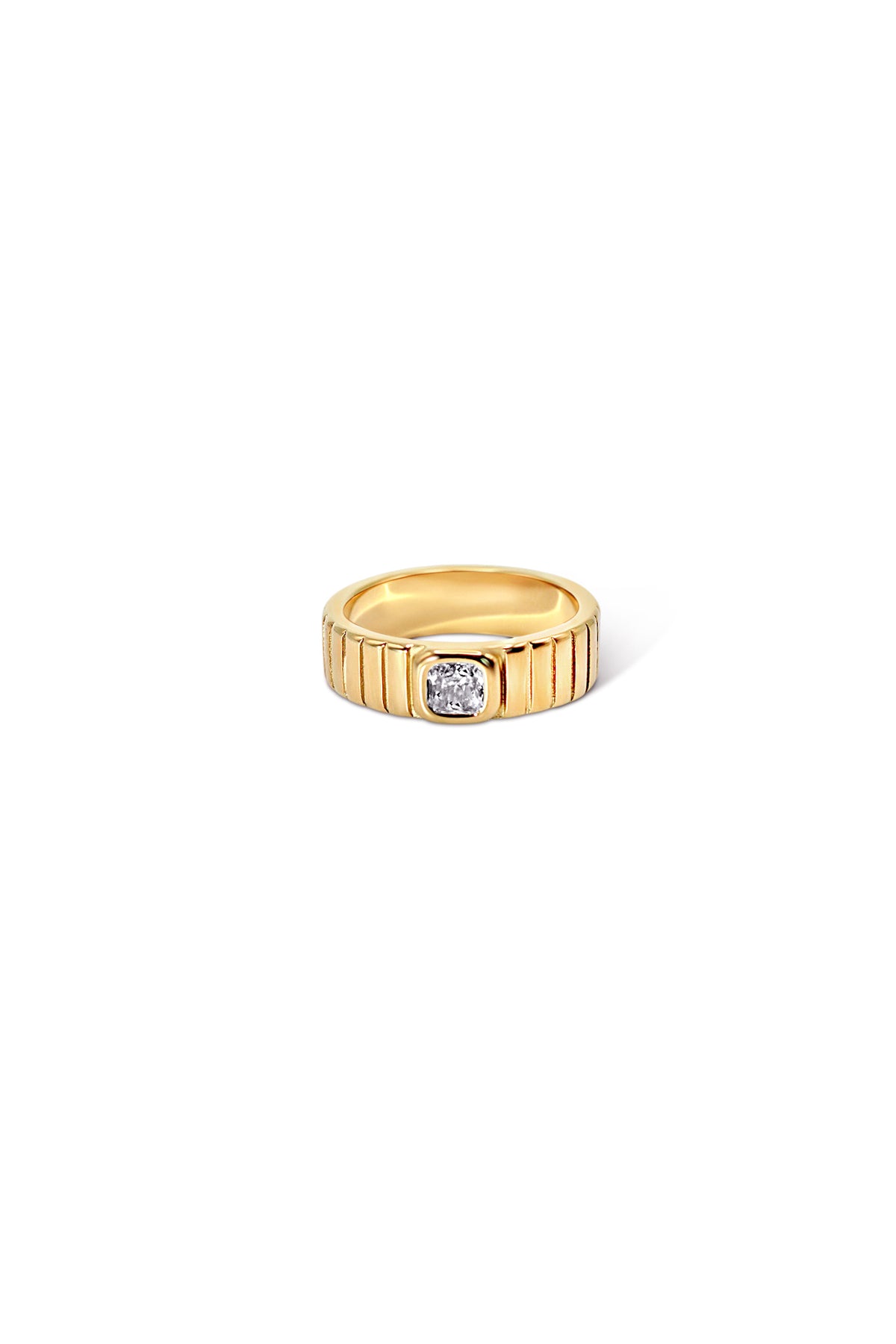 Vanessa gold-plated ring with a ridged wide band and a clear cushion-cut cubic zirconia, shown at an angle on white.
