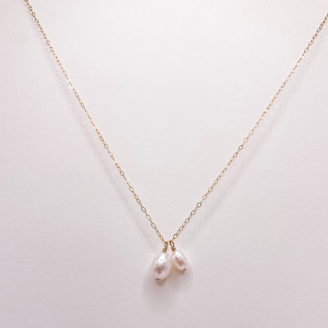 Double Pearls charm